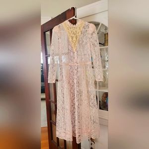 Vintage pale pink lace dress, fits size Medium.